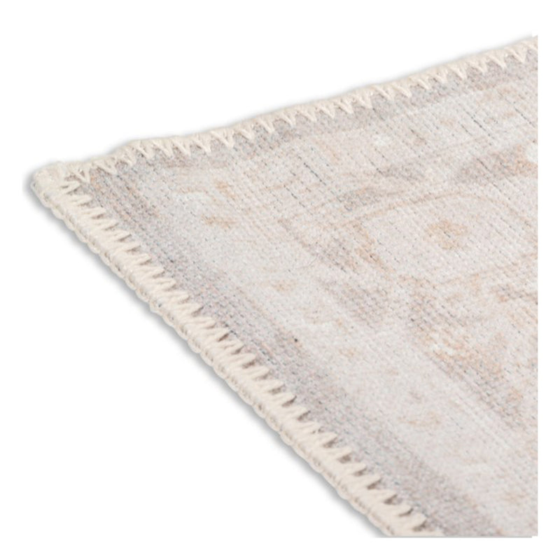 crown and birch aria spill proof washable rug beige gold corner