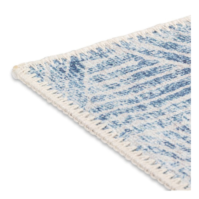 crown and birch aria spill proof washable rug blue white corner